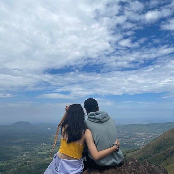 Happy Couple enjoying Himalayan Views